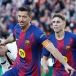 Robert Lewandowski esulta dopo un gol