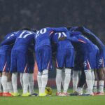 I giocatori del Chelsea in cerchio